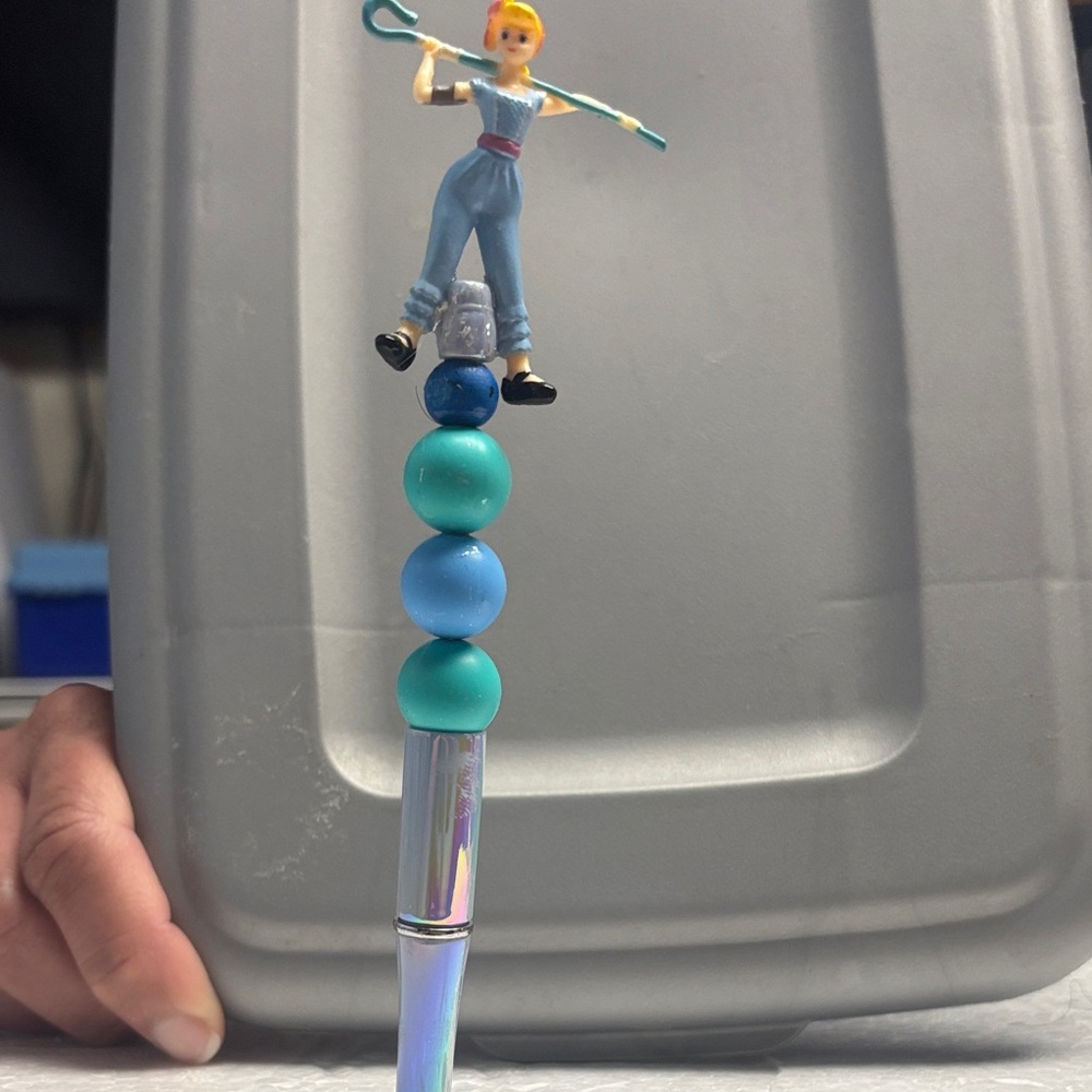 Colorful Stacking Toy with Figurine